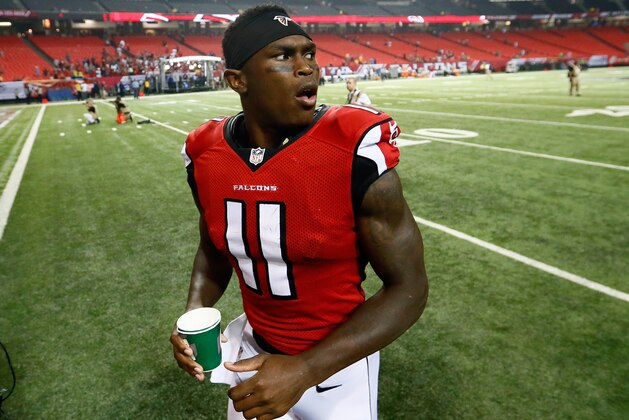 ATLANTA, GA - SEPTEMBER 18: Wide receiver Julio Jones #11 of the Atlanta Falcons walks off the field following a game against the Tampa Bay Buccaneers at the Georgia Dome on September 18, 2014 in Atlanta, Georgia.  (Photo by Kevin C. Cox/Getty Images)