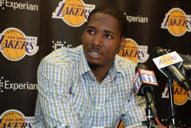 EL SEGUNDO, CA - JULY 23: Ed Davis #21 of the Los Angeles Lakers speaks to the media during a press conference on July 23, 2014 at the Toyota Sports Center in El Segundo, California.  NOTE TO USER: User expressly acknowledges and agrees that, by downloading and or using this photograph, User is consenting to the terms and conditions of the Getty Images License Agreement. Mandatory Copyright Notice: Copyright 2014 NBAE  (Photo by Andrew D. Bernstein/NBAE via Getty Images)