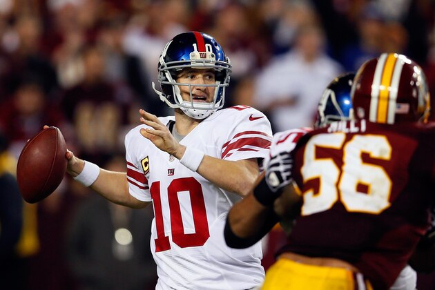 LANDOVER, MD - DECEMBER 03:  Quarterback Eli Manning #10 of the New York Giants drops back to pass against the Washington Redskins at FedExField on December 3, 2012 in Landover, Maryland.  (Photo by Rob Carr/Getty Images)