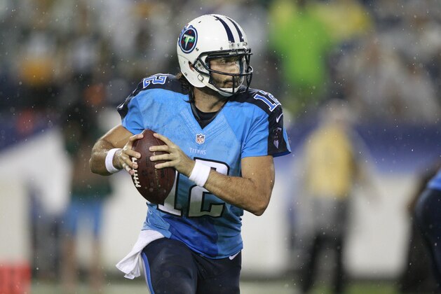 Tennessee Titans quarterback Charlie Whitehurst runs the ball in the third quarter of a preseason NFL football game against the Green Bay Packers Saturday, Aug. 9, 2014, in Nashville, Tenn. (AP Photo/Wade Payne)