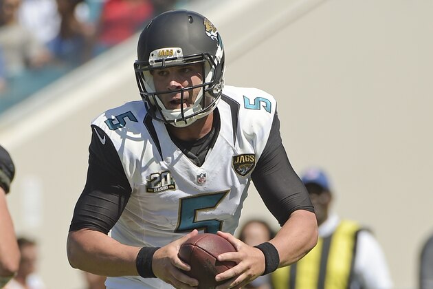 Jacksonville Jaguars quarterback Blake Bortles (5) looks for a receiver against the Indianapolis Colts during the second half of an NFL football game in Jacksonville, Fla., Sunday, Sept. 21, 2014. (AP Photo/Phelan M. Ebenhack)