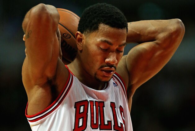 CHICAGO, IL - NOVEMBER 08:  Derrick Rose #1 of the Chicago Bulls shoots a free throw against the Utah Jazz at the United Center on November 8, 2013 in Chicago, Illinois. The Bulls defeated the Jazz 97-73. NOTE TO USER: User expressly acknowledges and agrees that, by downloading and or using this photograph, User is consenting to the terms and conditions of the Getty Images License Agreement.  (Photo by Jonathan Daniel/Getty Images)