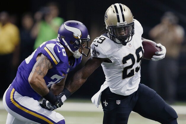 New Orleans Saints running back Khiry Robinson (29) carries against Minnesota Vikings strong safety Robert Blanton (36) in the first half of an NFL football game in New Orleans, Sunday, Sept. 21, 2014. (AP Photo/Rogelio Solis) New Orleans Saints running back Khiry Robinson (29) carries against Minnesota Vikings strong safety Robert Blanton (36) in the first half of an NFL football game in New Orleans, Sunday, Sept. 21, 2014. (AP Photo/Rogelio Solis)