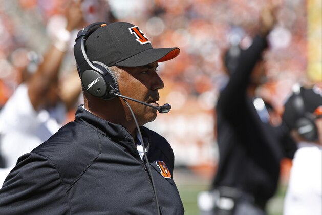 Cincinnati Bengals head coach Marvin Lewis works on the sidelines in the first half of an NFL football game against the Tennessee Titans, Sunday, Sept. 21, 2014, in Cincinnati. (AP Photo/David Kohl)