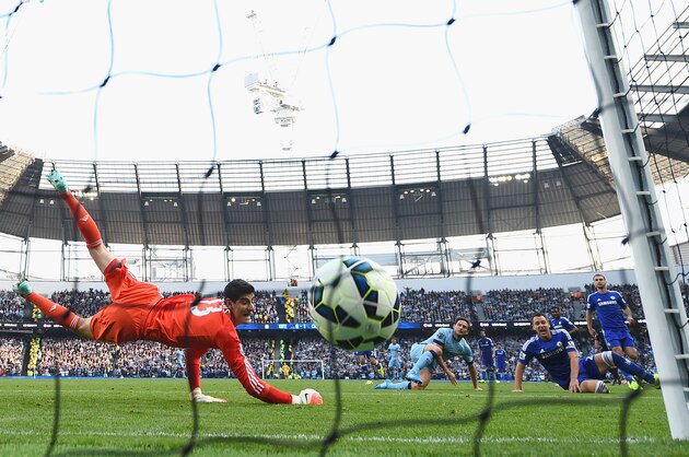 MANCHESTER, ENGLAND - SEPTEMBER 21: Frank Lampard of Manchester City scores the equalising goal past Thibaut Courtois of Chelsea during the Barclays Premier League match between Manchester City and Chelsea at Etihad Stadium on September 21, 2014 in Manchester, England.  (Photo by Laurence Griffiths/Getty Images)