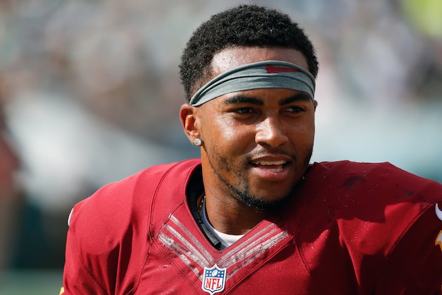 Washington Redskins' DeSean Jackson walks the sidelines during the second half of an NFL football game against the Philadelphia Eagles, Sunday, Sept. 21, 2014, in Philadelphia. (AP Photo/Matt Rourke)