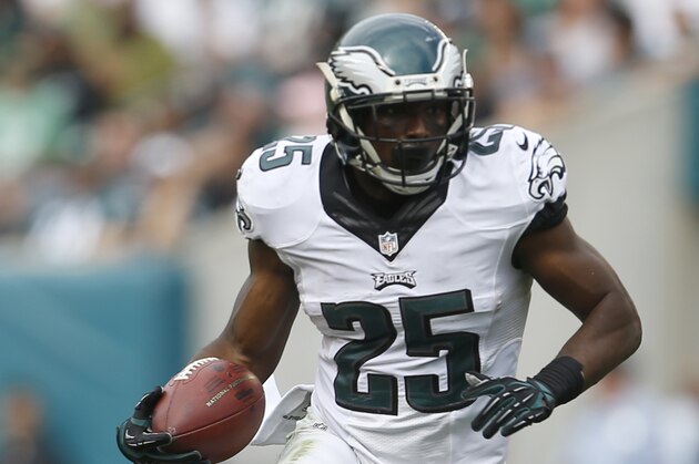 Philadelphia Eagles running back LeSean McCoy runs with the ball against the Washington Redskins during the second half of an NFL football game, Sunday, Sept. 21, 2014, in Philadelphia. (AP Photo/Michael Perez)