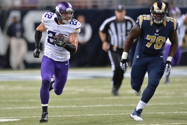 ST. LOUIS, MO - SEPTEMBER 7:  Harrison Smith #22 of the Minnesota Vikings returns and interception for a touchdown in the fourth quarter at the Edward Jones Dome on September 7, 2014 in St. Louis, Missouri. The Vikings defeated the Rams 34-6.  (Photo by Michael B. Thomas/Getty Images)
