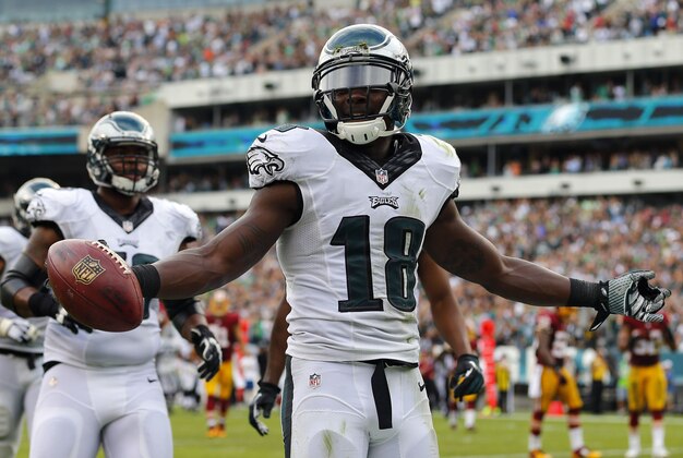 Sep 21, 2014; Philadelphia, PA, USA; Philadelphia Eagles wide receiver Jeremy Maclin (18) celebrates his touchdown against the Washington Redskins during the fourth quarter at Lincoln Financial Field. Mandatory Credit: Jeffrey G. Pittenger-USA TODAY Sports
