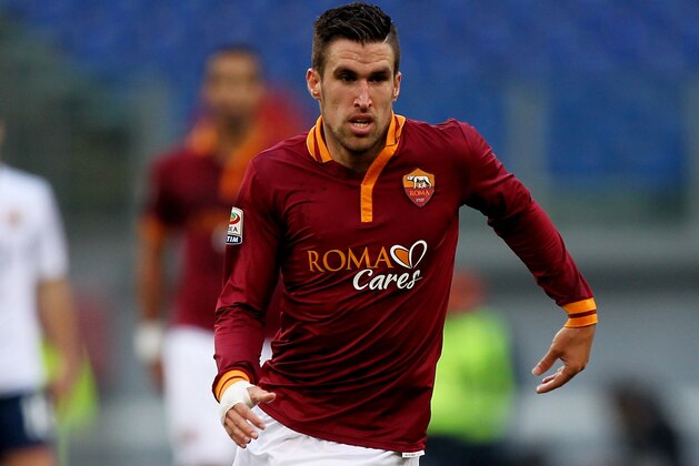 ROME, ITALY - JANUARY 12:  Kevin Strootman of AS Roma in action during the Serie A match between AS Roma and Genoa CFC at Stadio Olimpico on January 12, 2014 in Rome, Italy.  (Photo by Paolo Bruno/Getty Images)