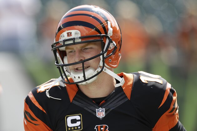 Cincinnati Bengals quarterback Andy Dalton warms up prior to an NFL football game against the Tennessee Titans, Sunday, Sept. 21, 2014, in Cincinnati. (AP Photo/Al Behrman)
