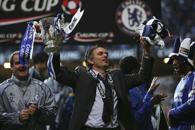 CARDIFF, UNITED KINGDOM - FEBRUARY 25: Chelsea Manager Jose Mourinho celebrates with the trophy following his team's victory at the end of the Carling Cup Final match between Chelsea and Arsenal at the Millennium Stadium on February 25, 2007 in Cardiff, Wales. (Photo by Alex Livesey/Getty Images)