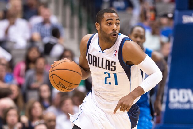 Oct 14, 2013; Dallas, TX, USA; Dallas Mavericks shooting guard Wayne Ellington (21) brings the ball up court during the game against the Orlando Magic at the American Airlines Center. The Magic defeated the Mavericks 102-94. Mandatory Credit: Jerome Miron-USA TODAY Sports