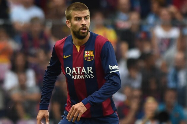 GENEVA, SWITZERLAND - AUGUST 06:  Gerard Pique of FC Barcelona in action during the pre-season friendly match between FC Barcelona and SSC Napoli on August 6, 2014 in Geneva, Switzerland.  (Photo by Valerio Pennicino/Getty Images)