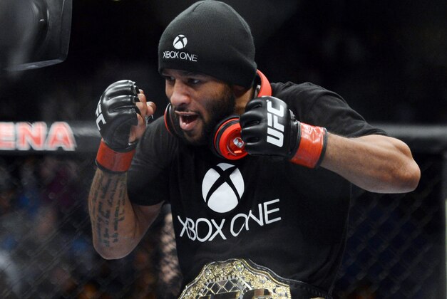 December 14, 2013; Sacramento, CA, USA; Demetrious Johnson celebrates after defeating Joseph Benavidez during the flyweight championship bout of the UFC on FOX 9 at Sleep Train Arena. Mandatory Credit: Kyle Terada-USA TODAY Sports