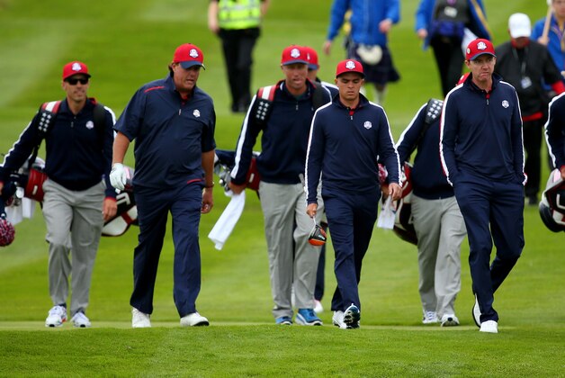 AUCHTERARDER, SCOTLAND - SEPTEMBER 23:  Phil Mickelson (2ndL), Rickie Fowler, Jimmy Walker (2ndR) and Andy North (R), Vice-Captain of the United States walk the course during practice ahead of the 2014 Ryder Cup on the PGA Centenary course at the Gleneagles Hotel on September 23, 2014 in Auchterarder, Scotland.  (Photo by Mike Ehrmann/Getty Images)