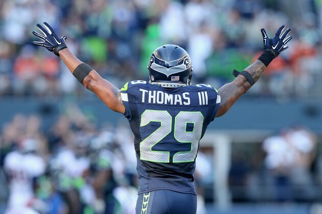 SEATTLE, WA - SEPTEMBER 21:  Free safety Earl Thomas #29 of the Seattle Seahawks celebrates an interception by teammate Kam Chancellor (not pictured) in the fourth quarter against the Denver Broncos at CenturyLink Field on September 21, 2014 in Seattle, Washington. The Seahawks defeated the Broncos 26-20.  (Photo by Jeff Gross/Getty Images)
