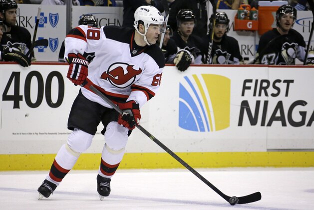 New Jersey Devils' Jaromir Jagr (68) skates during the second period of an NHL hockey game against the Pittsburgh Penguins in Pittsburgh Friday, Dec. 13, 2013. The Penguins won 3-2. (AP Photo/Gene J. Puskar)