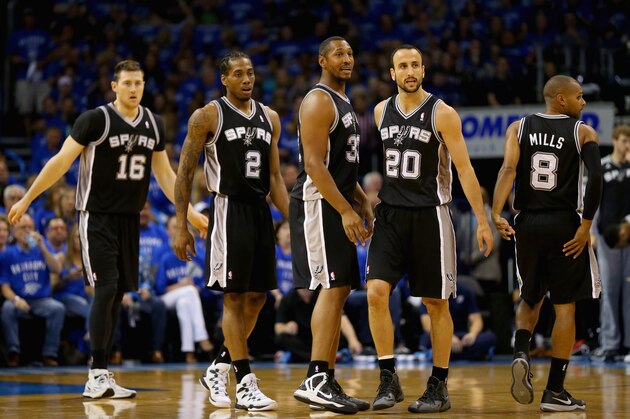 OKLAHOMA CITY, OK - MAY 25: Aron Baynes #16, Kawhi Leonard #2, Boris Diaw #33, Manu Ginobili #20 and Patty Mills #8 of the San Antonio Spurs look on in the second quarter against the Oklahoma City Thunder during Game Three of the Western Conference Finals of the 2014 NBA Playoffs at Chesapeake Energy Arena on May 25, 2014 in Oklahoma City, Oklahoma.  (Photo by Ronald Martinez/Getty Images)