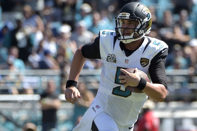 Jacksonville Jaguars quarterback Blake Bortles (5) scrambles for yardage during the second half of an NFL football game against the Indianapolis Colts in Jacksonville, Fla., Sunday, Sept. 21, 2014.(AP Photo/Phelan M. Ebenhack)
