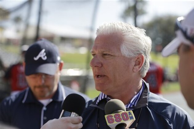 FILE - In this March 11, 2014, file photo, Atlanta Braves general manager Frank Wren meets the media before a spring exhibition baseball game against the Philadelphia Phillies in Kissimmee, Fla. The Braves have fired general manager Frank Wren. The move was announced Monday, Sept. 22, 2014, by team president John Schuerholz, one day after the team was eliminated from the NL playoff race. (AP Photo/Carlos Osorio, File)