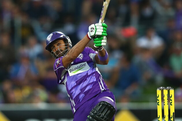 HOBART, AUSTRALIA - JANUARY 23: Shoaib Malik of the Hurricanes hits a six during the Big Bash League match between the Hobart Hurricanes and Brisbane Heat at Blundstone Arena on January 23, 2014 in Hobart, Australia.  (Photo by Robert Cianflone/Getty Images)