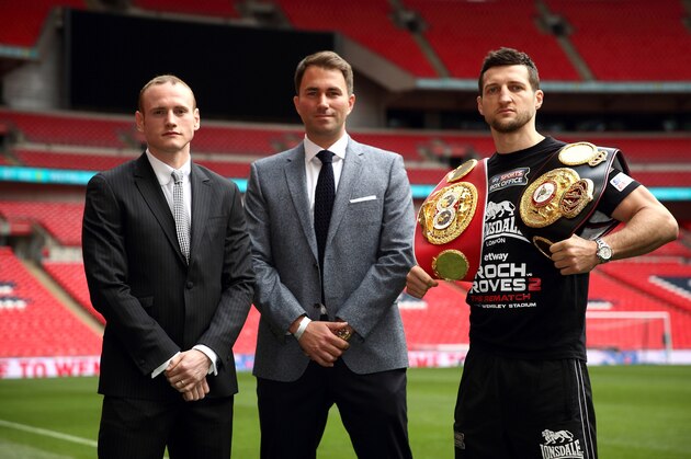 LONDON, ENGLAND - MAY 29:  Promoter Eddie Hearn stands inbetween Carl Froch and George Groves as they go head to head during a press conference to announce the upcoming WBA & IBF Super Middleweight World Championship fight between Carl Froch and George Groves at Wembley Stadium on May 29, 2014 in London, England.  (Photo by Jordan Mansfield/Getty Images)