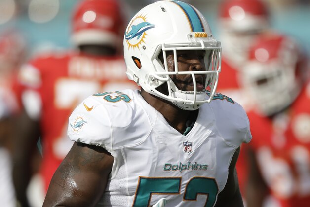Miami Dolphins linebacker Jelani Jenkins (53) runs off the field during the first half of an NFL football game against the Kansas City Chiefs, Sunday, Sept. 21, 2014, in Miami Gardens, Fla. (AP Photo/Wilfredo Lee)