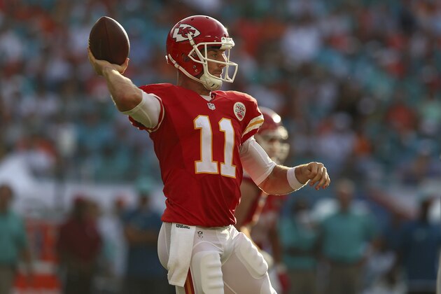 MIAMI GARDENS, FL - SEPTEMBER 21:  Quarterback Alex Smith #11 of the Kansas City Chiefs passes against the Miami Dolphins during their game at Sun Life Stadium on September 21, 2014 in Miami Gardens, Florida.  (Photo by Ronald Martinez/Getty Images)