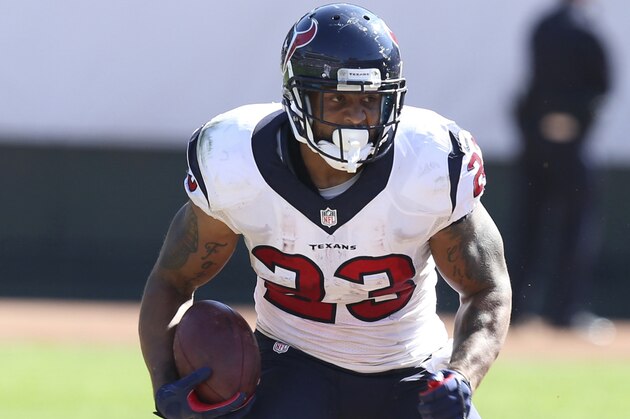 Houston Texans RB #23 Arian Foster in action in the third quarter in a game against the Oakland Raiders at the O.co Coliseum at an NFL game in Oakland, Calif. on Sunday Sept. 14, 2014. (AP Photo/David Seelig)