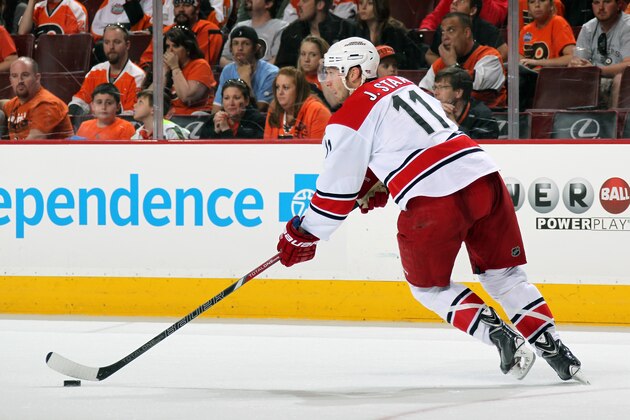 PHILADELPHIA, PA - APRIL 13:  Jordan Staal #11 of the Carolina Hurricanes skates the puck against the Philadelphia Flyers on April 13, 2014 at the Wells Fargo Center in Philadelphia, Pennsylvania.  (Photo by Len Redkoles/NHLI via Getty Images)