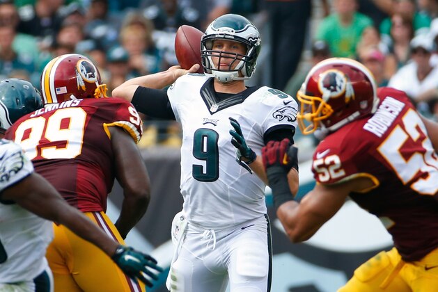 Philadelphia Eagles' Nick Foles passes during the second half of an NFL football game against the Washington Redskins, Sunday, Sept. 21, 2014, in Philadelphia. (AP Photo/Matt Rourke)