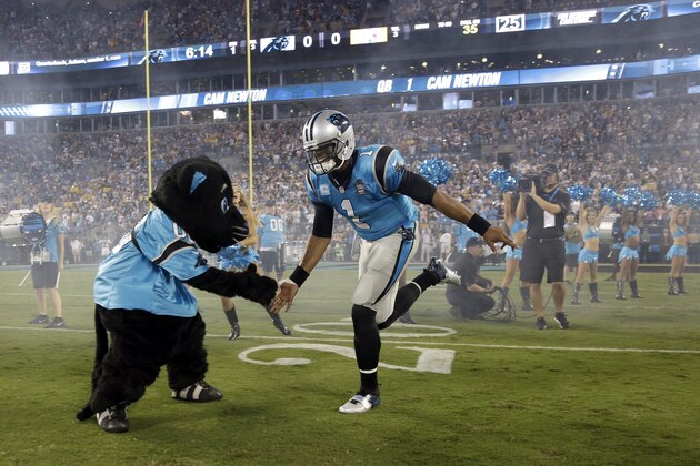 Carolina Panthers' Cam Newton (1) during introductions before an NFL football game against the Pittsburgh Steelers in Charlotte, N.C., Sunday, Sept. 21, 2014. The Steelers won 37-19. (AP Photo/Bob Leverone)