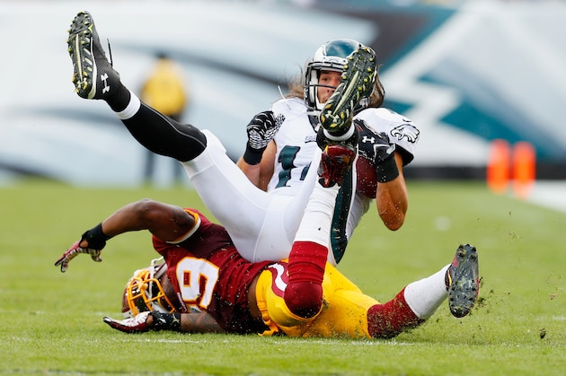 PHILADELPHIA, PA - SEPTEMBER 21:  Riley Cooper #14 of the Philadelphia Eagles makes a catch against  David Amerson #39 of the Washington Redskins in the fourth quarter at Lincoln Financial Field on September 21, 2014 in Philadelphia, Pennsylvania.  (Photo by Rich Schultz/Getty Images)