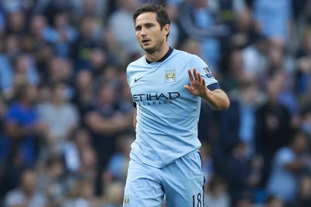 Manchester City's Frank Lampard reacts after scoring against his former club Chelsea during their English Premier League soccer match at the Etihad Stadium, Manchester, England, Sunday Sept. 21, 2014. Lampard scored the equalising goal after an opening gaol by Chelsea's Andre Schurrle. (AP Photo/Jon Super)
