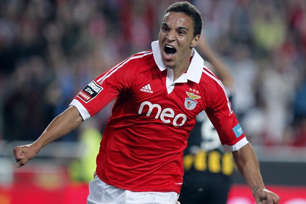 Benfica's Rodrigo Moreno, from Spain, celebrates after scoring his team's second goal during their Portuguese league soccer match against Beira-Mar at Benfica's Luz stadium in Lisbon, Saturday, Oct. 6, 2012. (AP Photo/Francisco Seco)