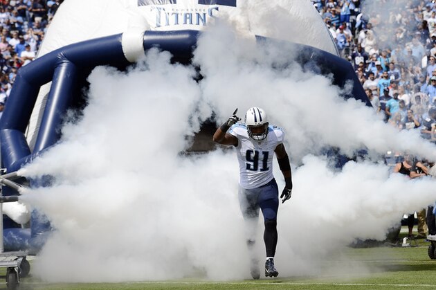 Tennessee Titans outside linebacker Derrick Morgan is introduced before an NFL football game between the Titans and the Dallas Cowboys Sunday, Sept. 14, 2014, in Nashville, Tenn. (AP Photo/Mark Zaleski)
