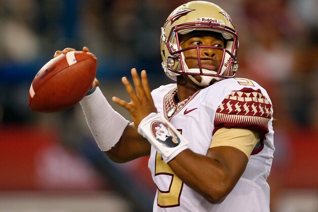 ARLINGTON, TX - AUGUST 30:  Jameis Winston #5 of the Florida State Seminoles passes against the Oklahoma State Cowboys in the first half of the Advocare Cowboys Classic at AT&T Stadium on August 30, 2014 in Arlington, Texas.  (Photo by Tom Pennington/Getty Images)