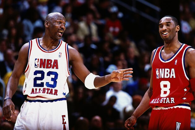 ATLANTA - FEBRUARY 9:  Michael Jordan #23 of the Eastern Conference All Stars talks with Kobe Bryant #8 of the Western Conference All Stars during the 2003 NBA All-Star Game at the Phillips Arena on February 9, 2003 in Atlanta, Georgia.  The West won 155-145 in the first double-overtime All-Star game.  NOTE TO USER: User expressly acknowledges and agrees that, by downloading and/or using this Photograph, User is consenting to the terms and conditions of the Getty Images License Agreement.  Mandatory Copyright Notice:  Copyright 2003 NBAE  (Photo by Andrew D. Bernstein/NBAE/Getty Images)