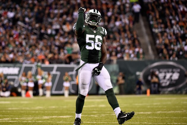 EAST RUTHERFORD, NJ - SEPTEMBER 22:  Inside linebacker Demario Davis #56 of the New York Jets celebrates a sack against the Chicago Bears during a game at MetLife Stadium on September 22, 2014 in East Rutherford, New Jersey.  (Photo by Alex Goodlett/Getty Images)
