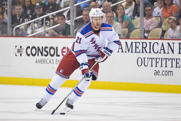 PITTSBURGH, PA - MAY 13:  Derek Stepan #21 of the New York Rangers skates with the puck against the Pittsburgh Penguins in Game Seven of the Second Round of the 2014 NHL Stanley Cup Playoffs on May 13, 2014 at CONSOL Energy Center in Pittsburgh, Pennsylvania.  (Photo by Jamie Sabau/Getty Images)