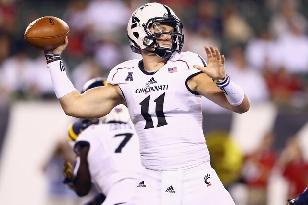 CINCINNATI, OH - SEPTEMBER 12:  Gunner Kiel #11 of the Cincinnati Bearcats throws a pass during the game against the Toledo Rockets at Paul Brown Stadium on September 12, 2014 in Cincinnati, Ohio.  (Photo by Andy Lyons/Getty Images)