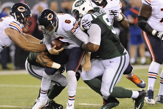Chicago Bears quarterback Jay Cutler (6) is sacked by New York Jets defensive end Sheldon Richardson (91) in the third quarter of an NFL football game, Monday, Sept. 22, 2014, in East Rutherford, N.J. (AP Photo/Bill Kostroun)