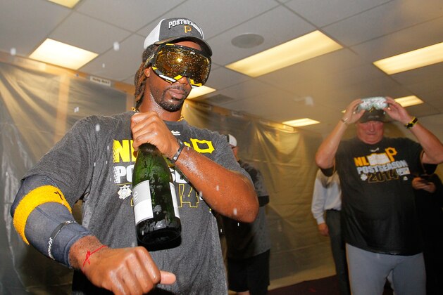 ATLANTA, GA - SEPTEMBER 23: Andrew McCutchen #22 of the Pittsburgh Pirates celebrates clinching a National League playoff spot after their 3-2 win over the Atlanta Braves at Turner Field on September 23, 2014 in Atlanta, Georgia. (Photo by Kevin C. Cox/Getty Images) ATLANTA, GA - SEPTEMBER 23: Andrew McCutchen #22 of the Pittsburgh Pirates celebrates clinching a National League playoff spot after their 3-2 win over the Atlanta Braves at Turner Field on September 23, 2014 in Atlanta, Georgia. (Photo by Kevin C. Cox/Getty Images)