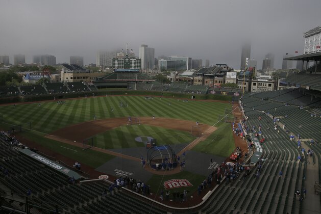 Fog surrounds Wrigley Field before a baseball game between the New York Mets and the Chicago Cubs in Chicago, Wednesday, June 4, 2014. (AP Photo/Nam Y. Huh)