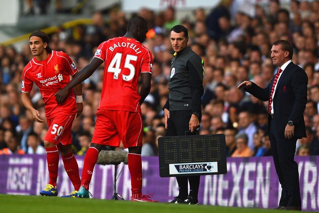 LONDON, ENGLAND - AUGUST 31:  Brendan Rodgers, manager of Liverpool looks on as Lazar Markovic of Liverpool replaces Mario Balotelli of Liverpool during the Barclays Premier League match between Tottenham Hotspur and Liverpool at White Hart Lane on August 31, 2014 in London, England.  (Photo by Jamie McDonald/Getty Images)