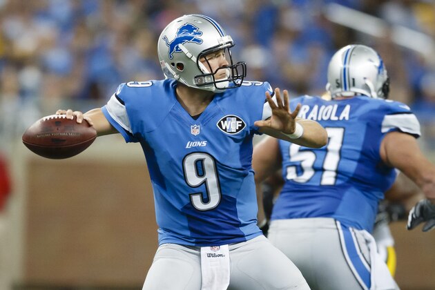 Detroit Lions quarterback Matthew Stafford (9) passes the ball against the Green Bay Packers during an NFL football game at Ford Field in Detroit, Sunday, Sept. 21, 2014. (AP Photo/Rick Osentoski)