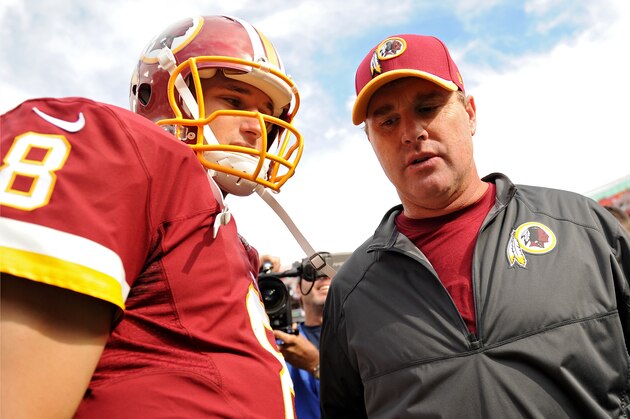 LANDOVER, MD - SEPTEMBER 14: Quarterback Kirk Cousins #8 of the Washington Redskins talks with head coach Jay Gruden after defeating the Jacksonville Jaguars at FedExField on September 14, 2014 in Landover, Maryland. (Photo by Patrick Smith/Getty Images)