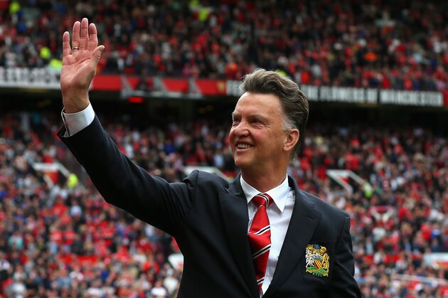 MANCHESTER, ENGLAND - AUGUST 16:  Manchester United Manager Louis van Gaal waves to the crowd prior to the Barclays Premier League match between Manchester United and Swansea City at Old Trafford on August 16, 2014 in Manchester, England.  (Photo by Alex Livesey/Getty Images)