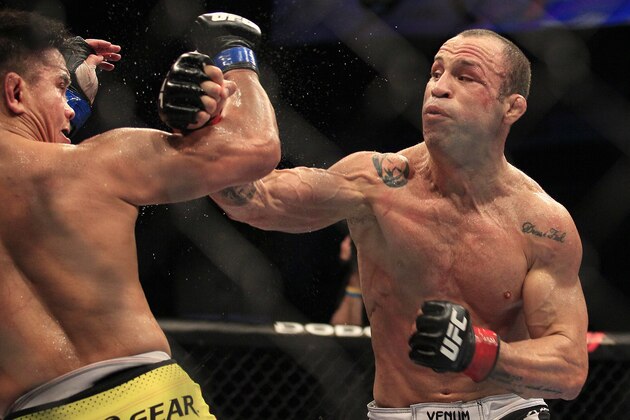 Wanderlei Silva, right, punches Cung Le during the second round of a UFC 139 Mixed Martial Arts middleweight bout in San Jose, Calif., Saturday, Nov. 19, 2011. Silva won by TKO in the second round. (AP Photo/Jeff Chiu)